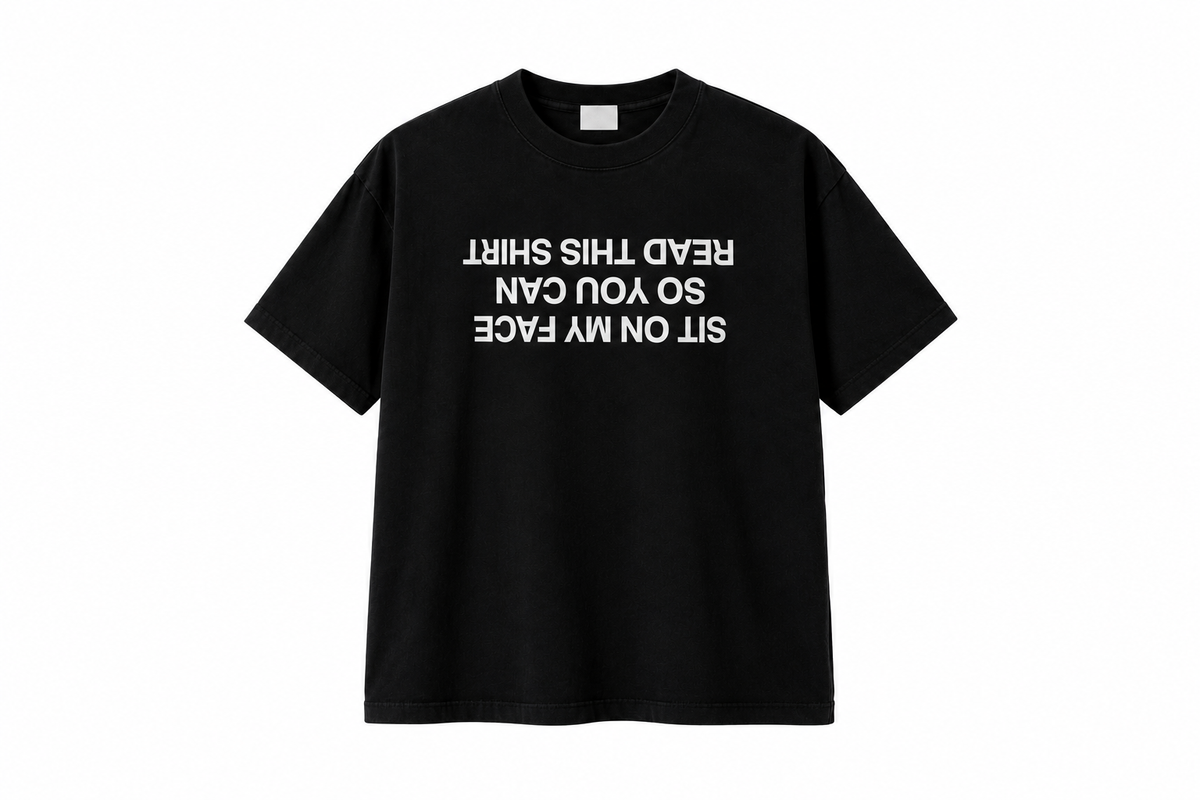 Sit On My Face Tee: black tee with upside-down white text